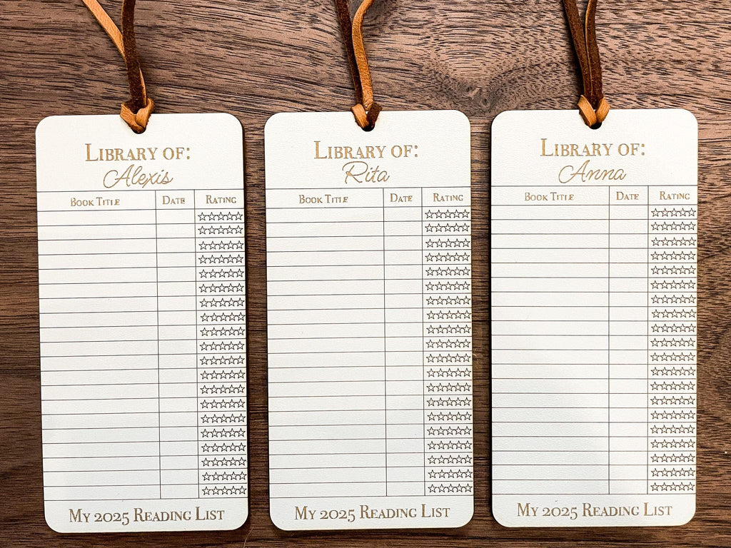 This bookmark features a library checkout card design, complete with a suede string detail for a stylish touch. (listing is for one bookmark)