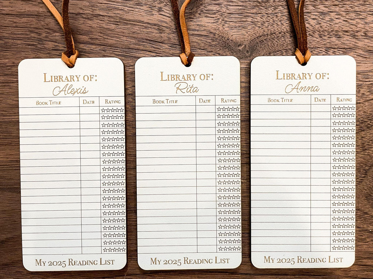 This bookmark features a library checkout card design, complete with a suede string detail for a stylish touch. (listing is for one bookmark)