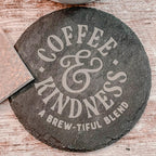 Coffee and Kindness a brew-tiful blend engraved on round slate coasters, set of 4
