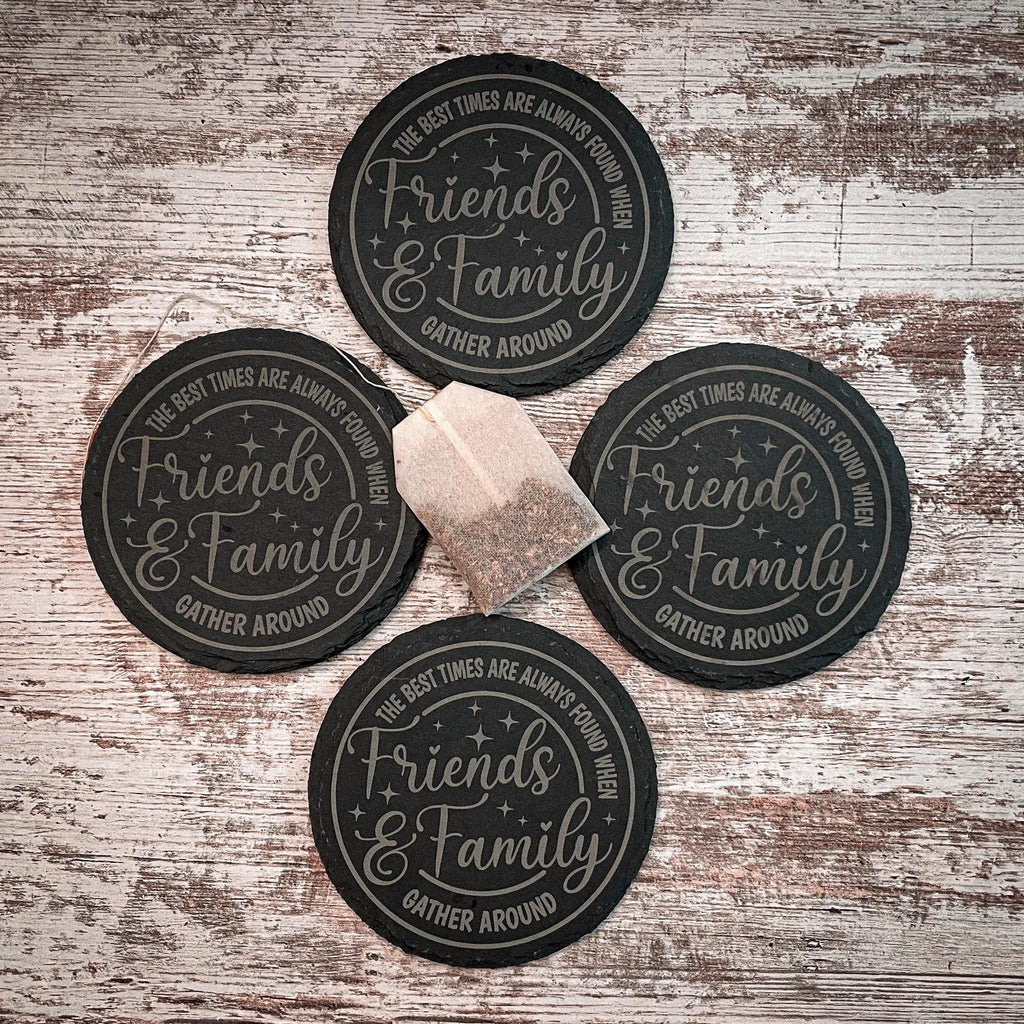 The best times are always found when friends and family gather round engraved on round slate coasters, set of 4
