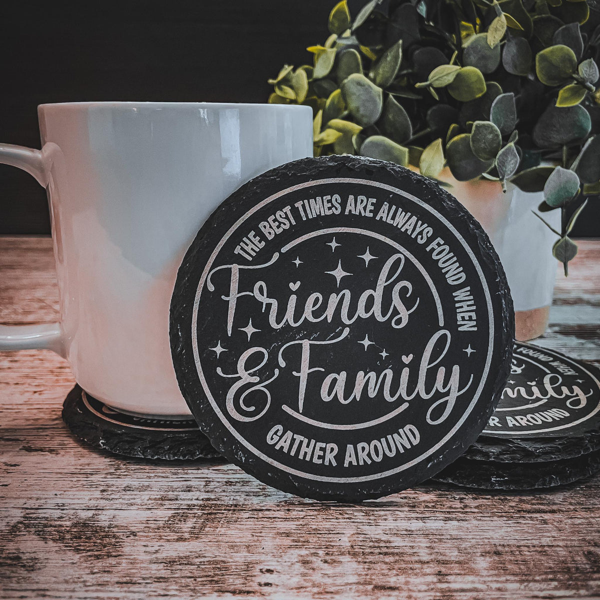 The best times are always found when friends and family gather round engraved on round slate coasters, set of 4