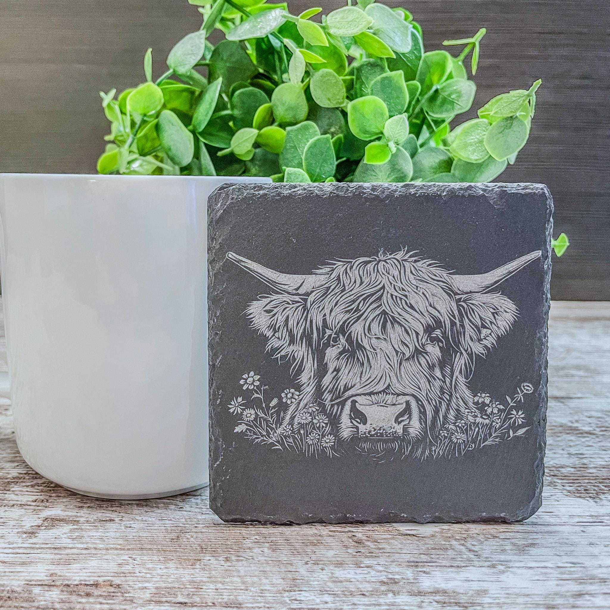 Highland cow pictures laser engraved on slate coasters, perfect for fans of cows!