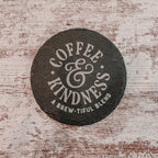 Coffee and Kindness a brew-tiful blend engraved on round slate coasters, set of 4