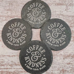 Coffee and Kindness a brew-tiful blend engraved on round slate coasters, set of 4