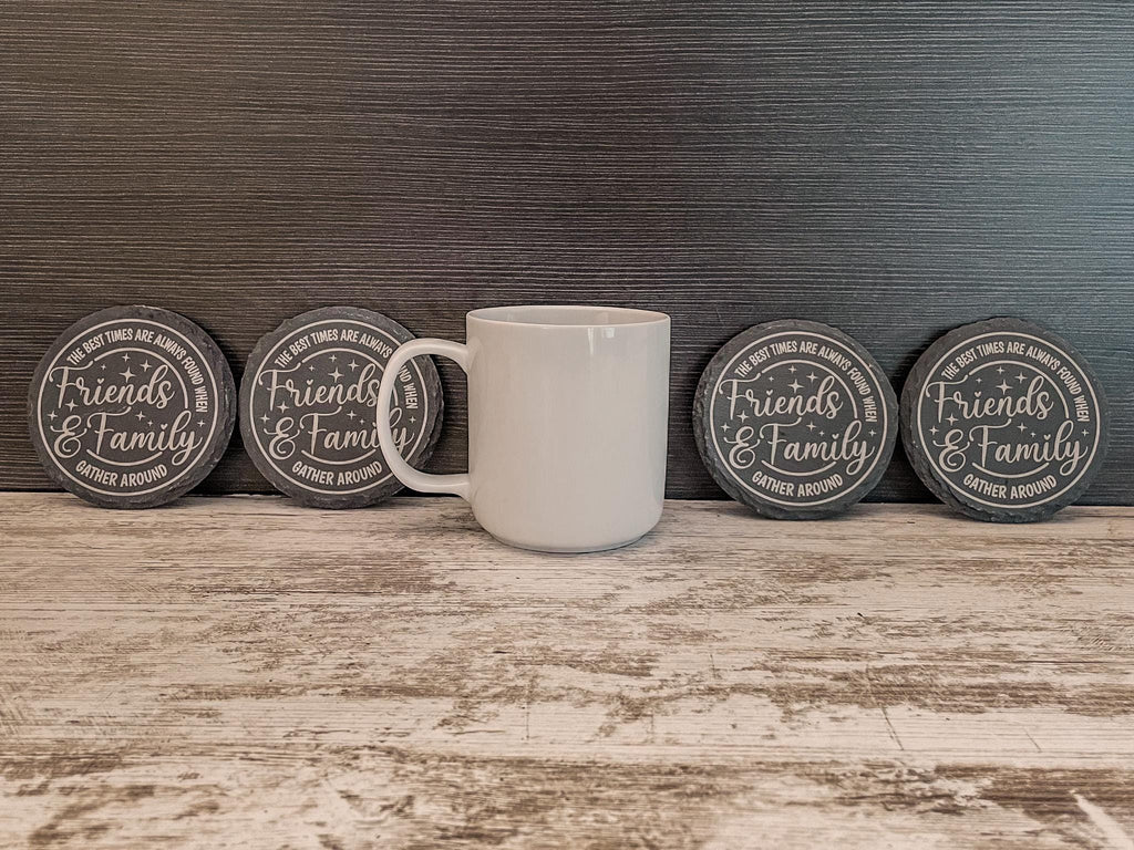 The best times are always found when friends and family gather round engraved on round slate coasters, set of 4