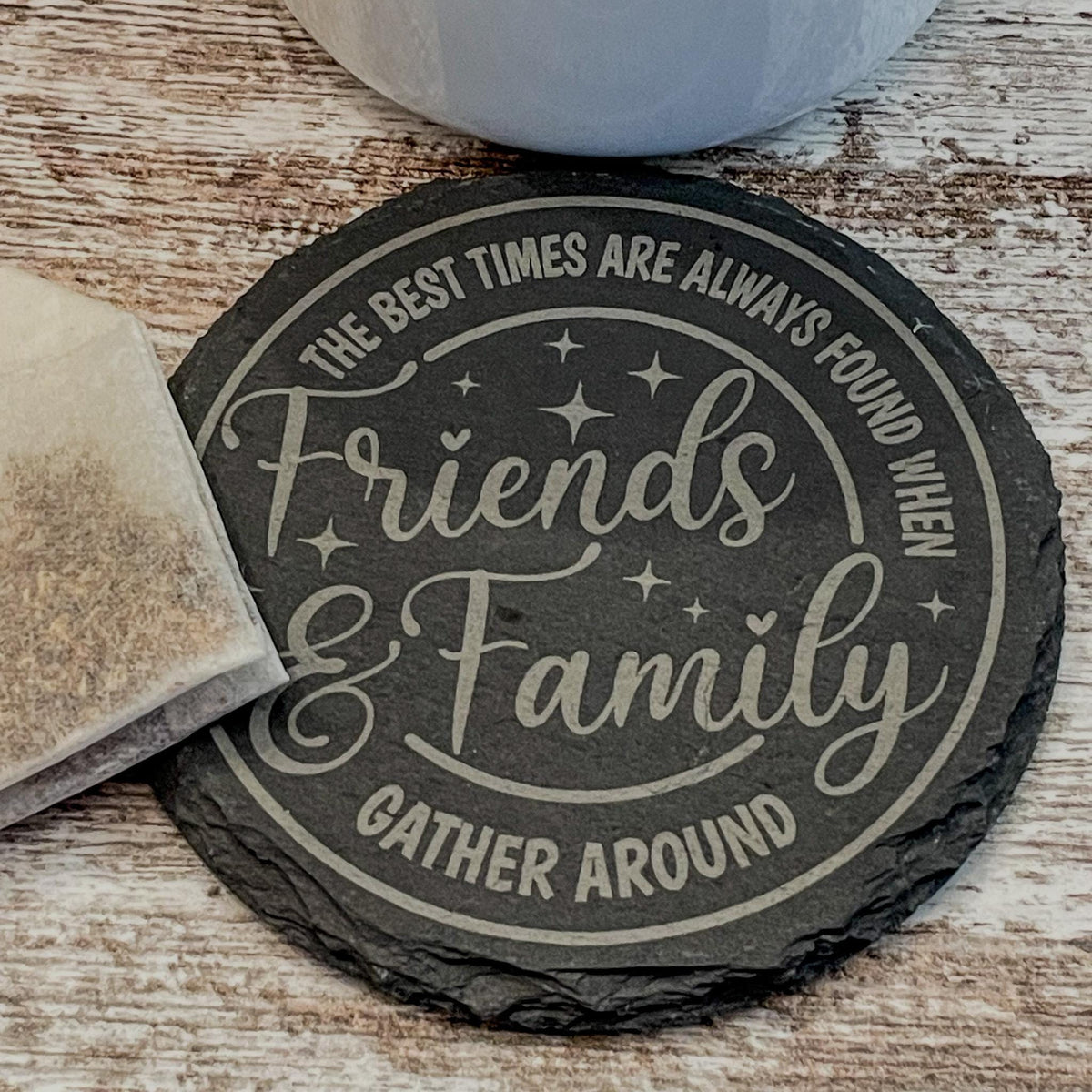 The best times are always found when friends and family gather round engraved on round slate coasters, set of 4