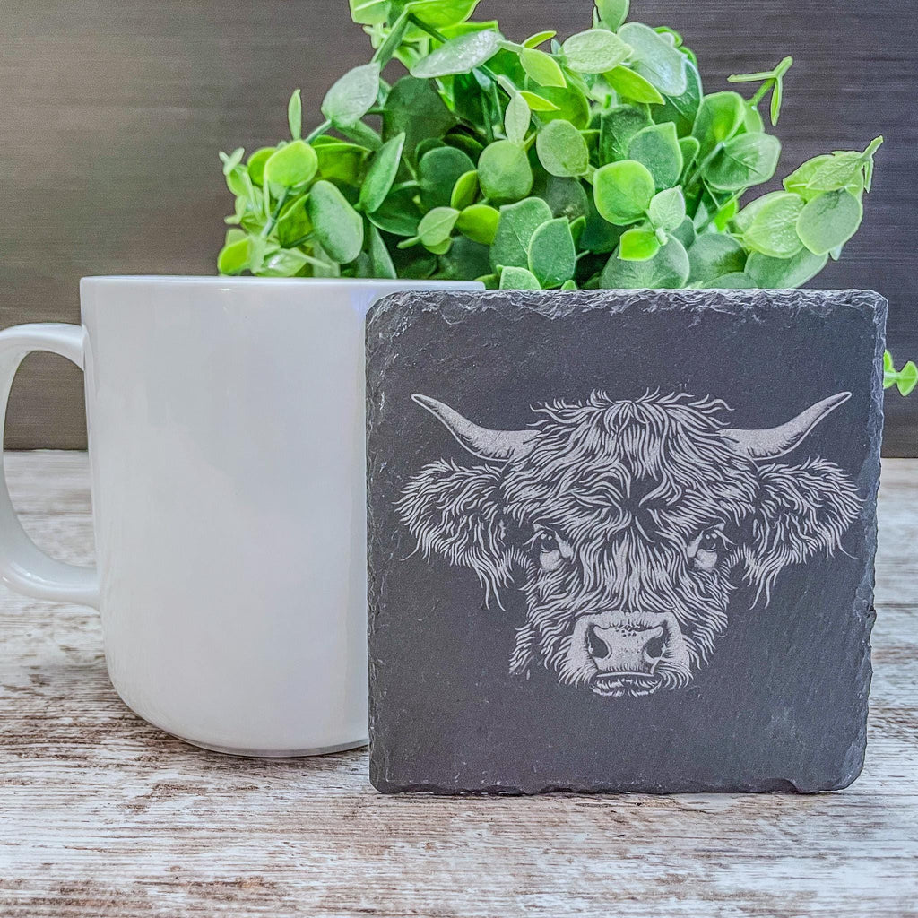 Highland cow pictures laser engraved on slate coasters, perfect for fans of cows!