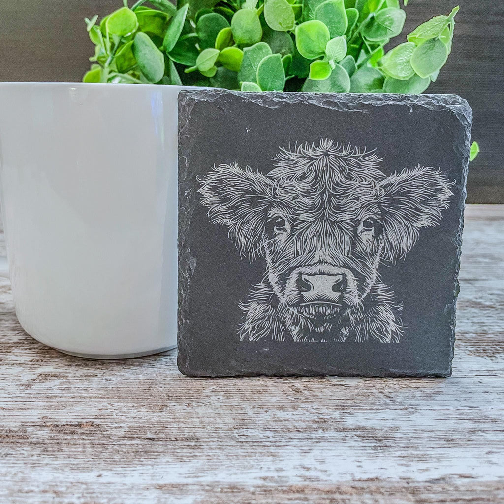 Highland cow pictures laser engraved on slate coasters, perfect for fans of cows!