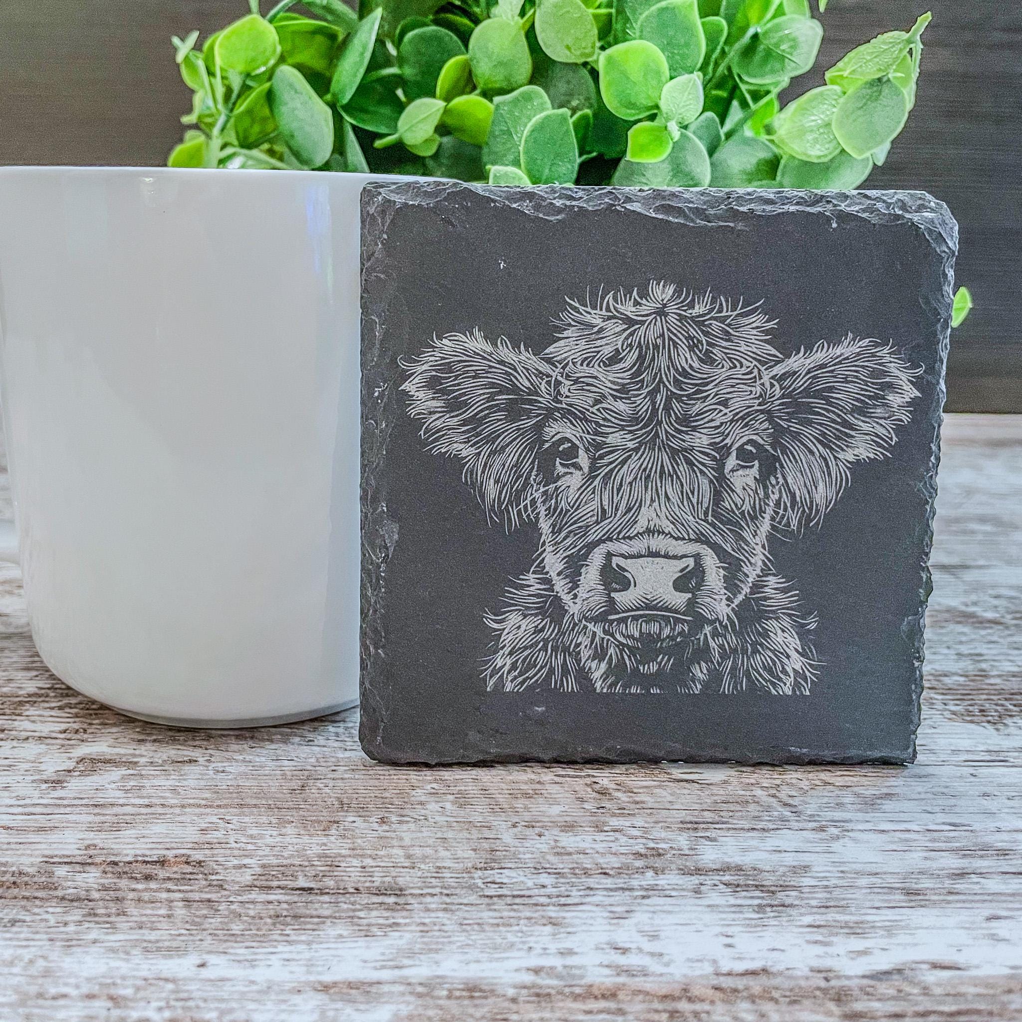 Highland cow pictures laser engraved on slate coasters, perfect for fans of cows!