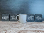 Slate coasters with bass fish laser engraved on them in 4 different scenes.