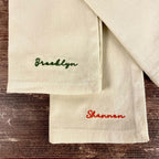 Embroidered napkin with personalized name, custom dinner napkin for holiday table settings, and hostess gifts